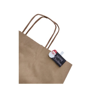 Saco de papel castanho com etiqueta Merry Christmas e imagem de Pai Natal