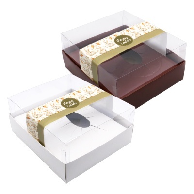 Duas caixas para bolos, uma branca e outra castanha, com tampa transparente e faixa decorativa Happy Easter