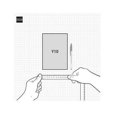 Bloco de notas cinza com texto Y10, caneta transparente e régua sobre fundo quadriculado