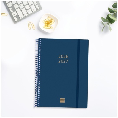 Agenda azul escura espiral com elástico e texto 2026 2027