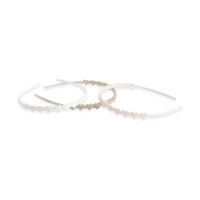 Três bandas de cabelo finas em tons bege, branco e rosa claro com textura zigzag