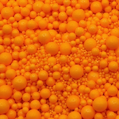 Esferas de espuma laranja agrupadas de vários tamanhos