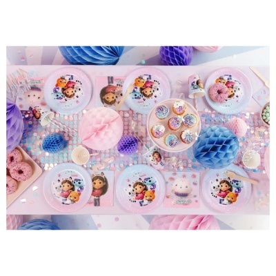 Mesa de festa infantil com pratos, copos, guardanapos e decorações coloridas e com personagens animadas.