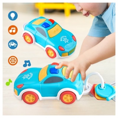 Carrinho de brinquedo azul com botões coloridos e chaves de brinquedo