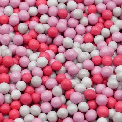 Esferas pequenas coloridas em vermelho, rosa e branco