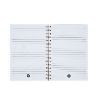 Caderno espiral aberto com páginas brancas pautadas