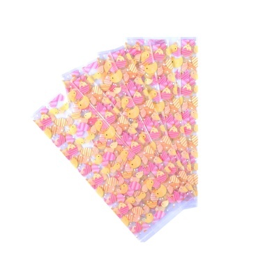 Conjunto de sacos plásticos transparentes com padrão de abelhas e listras cor-de-rosa