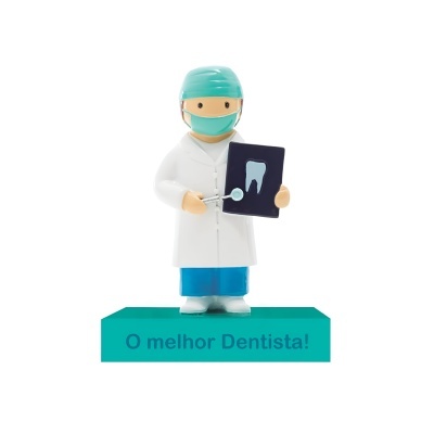 Figura decorativa dentista com raio-x dentário e base verde com texto