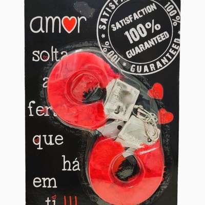 Par de algemas vermelhas em embalagem preta com texto motivacional e selo de garantia.