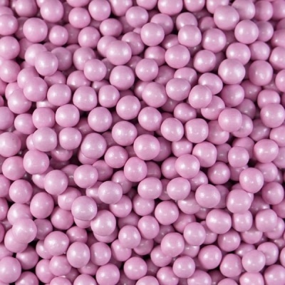Bolas pequenas cor de rosa claro brilhantes e lisas cobrindo toda a área
