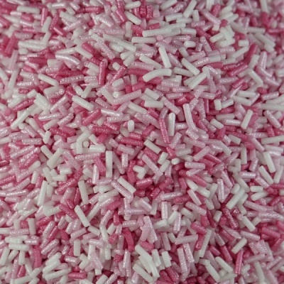 Confeitos granulados rosa e branco com brilho