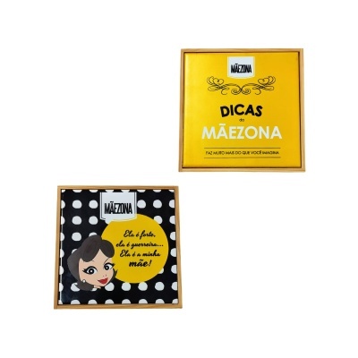 Dois quadros decorativos, um amarelo com texto e outro preto com bolinhas e rosto feminino.