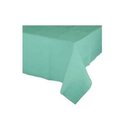 Guardanapo de tecido verde-água em canto de mesa branca