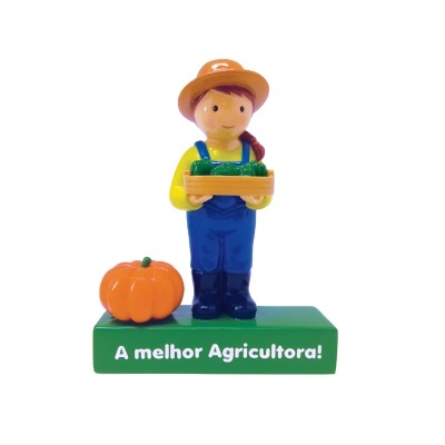 Figura decorativa de agricultora com abóbora e base verde com texto