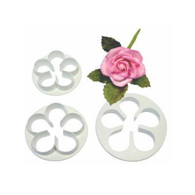 Cortadores brancos em forma de flor e flor rosa artificial