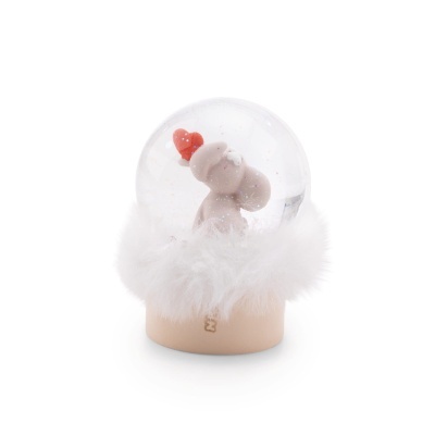 Globo de neve com base creme e figura interior com chapéu vermelho