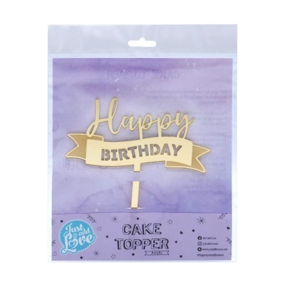 Topper para bolo dourado com Happy BIRTHDAY numa embalagem transparente com fundo lilás
