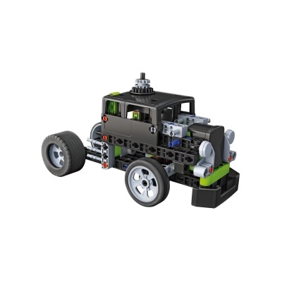 Veículo de construção tipo Lego técnico de cores preto, cinzento e verde com rodas e luzes traseiras vermelhas