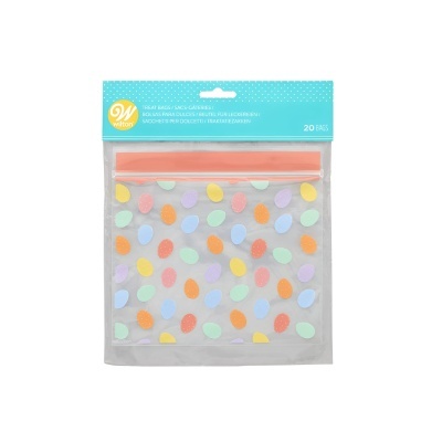 Sacos plásticos transparentes com padrão de gotas coloridas e fecho cor-de-rosa em embalagem Wilton