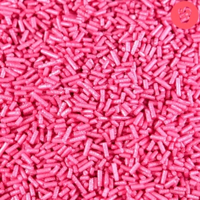 granulações cilíndricas cor de rosa brilhantes