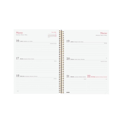 Agenda semanal aberta com espiral dourada mostrando dias de março de 16 a 22