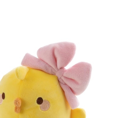 Pelúcia amarela com laço rosa e olhos bordados