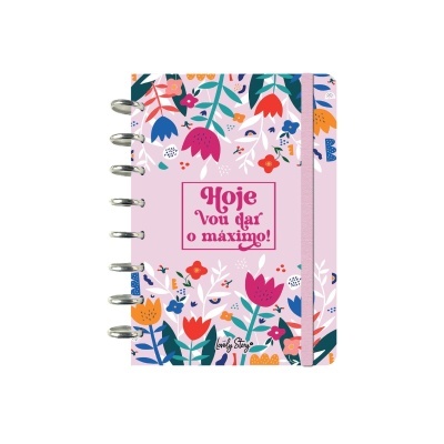 Caderno floral rosa com texto na capa e elástico cor-de-rosa
