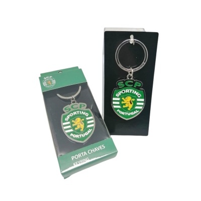 Chaveiro com emblema do Sporting Portugal e embalagem original com texto