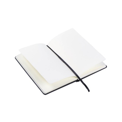 Caderno aberto com páginas em branco e marcador preto