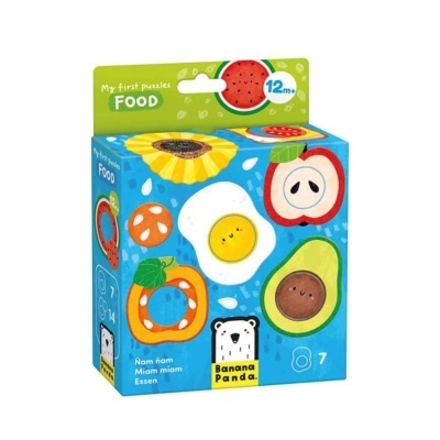 Caixa colorida de puzzle infantil com desenhos de alimentos e texto em inglês e outros idiomas