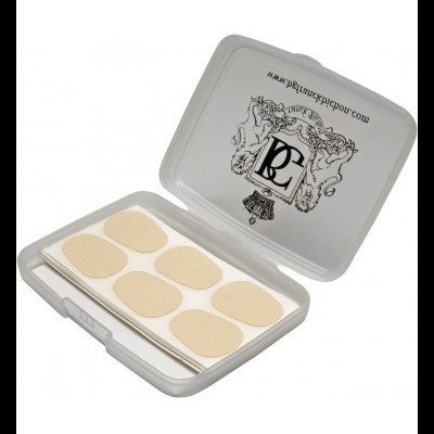 Estojo branco com adesivos ovais bege