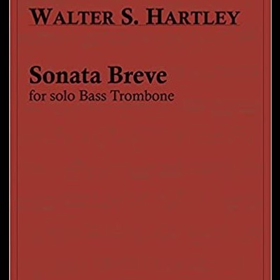 Capa vermelha de livro de partituras com texto preto