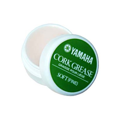 Frasco branco aberto de gordura para rolha Yamaha com tampa verde e texto branco