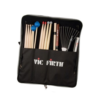 Estojo preto VIC FIRTH com baquetas e acessórios de bateria organizados