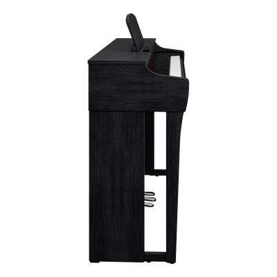 Piano digital preto visto de lado com três pedais