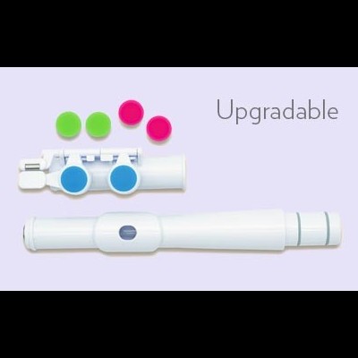 Instrumento musical branco desmontado com tampa colorida e texto 'Upgradable'