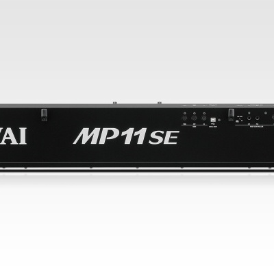 Interface de áudio KAWAI MP11 SE preta com texto branco, vista frontal.