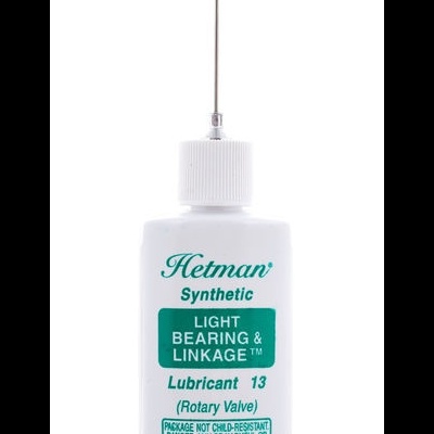 Garrafa branca de lubrificante sintético com aplicador fino