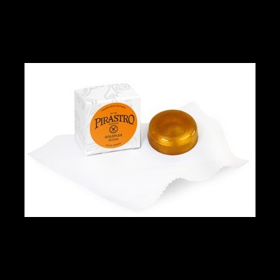 Massa para violino dourada com caixa branca 'PIRASTRO GOLDFLEX VIOLIN' sobre pano branco