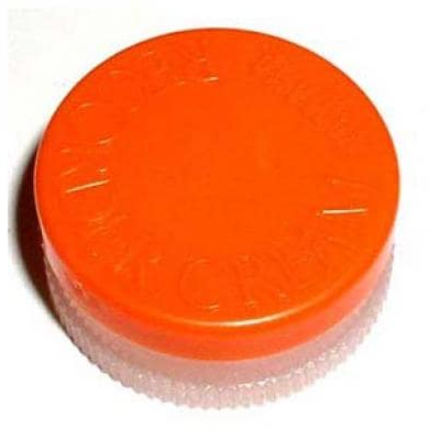 Tampa de plástico laranja e branca translúcida com textura dentada