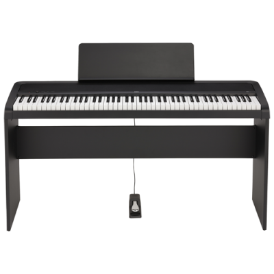 Piano digital preto com 88 teclas e pedal de sustain