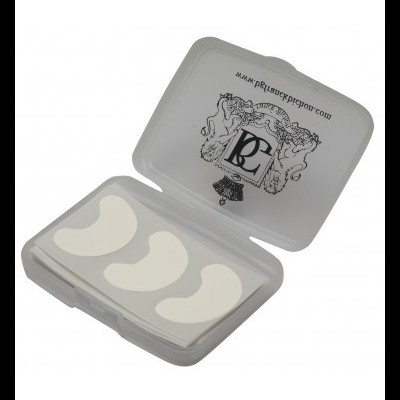 Estojo cinzento com três almofadas brancas em meia-lua para olhos