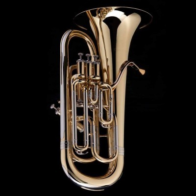 Instrumento musical metálico dourado tipo eufónio sobre fundo preto