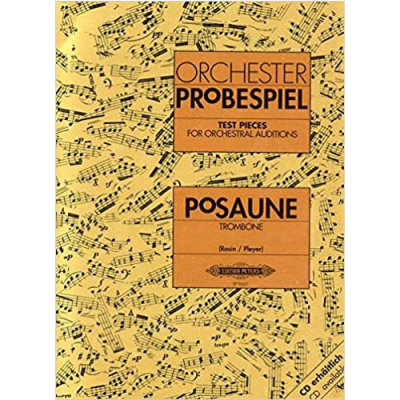 Livro de partituras amarelo com texto ORCHESTER PROBESPIEL e POSAUNE TROMBONE