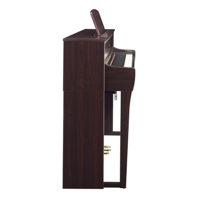 Piano digital de madeira escura visto de lado