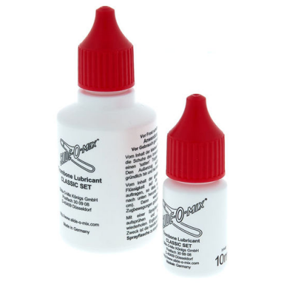 Frascos brancos de lubrificante silicone com tampas vermelhas lado a lado