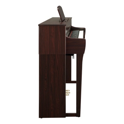 Piano digital vertical em madeira escura com pedais e suporte para partitura