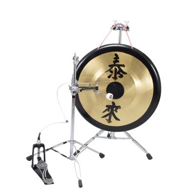 gongo dourado com borda preta e estrutura metálica com pedal