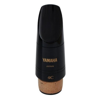 Boquilha preta para instrumento musical com rolha de cortiça e inscrições douradas