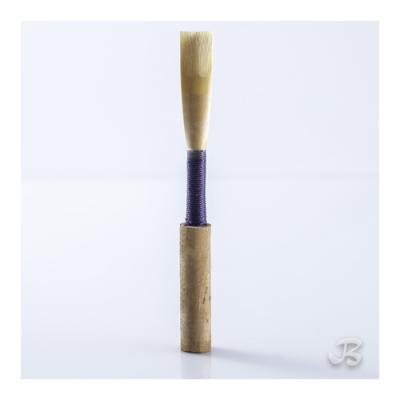 Palheta de madeira para clarinete com fita roxa